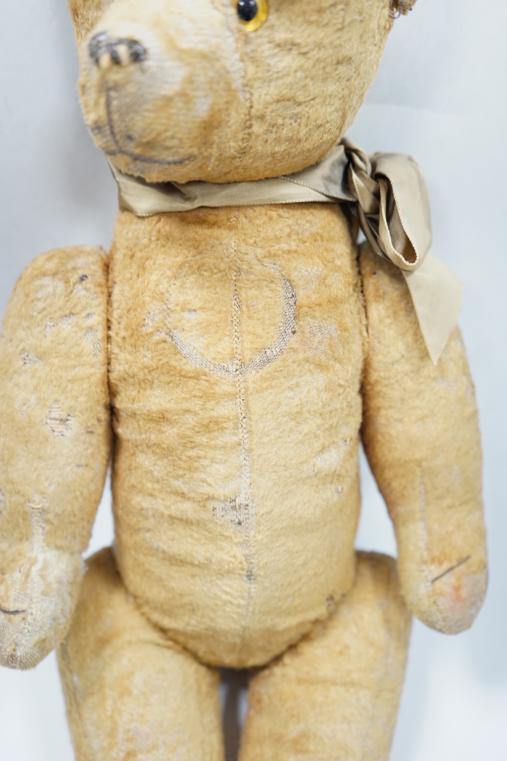 A 1930’s jointed Teddy bear, 53cm. Condition - poor